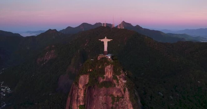 Aerial view of Christ the Redeemer statue at sunset Brazil.