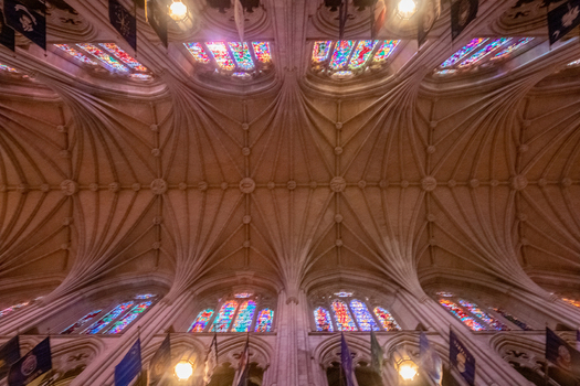 Washington District of Columbia United States 06 May 2025 View of the intricate Gothic vaulted ceiling and colorful stained glass windows inside the Washington National Cathedral.