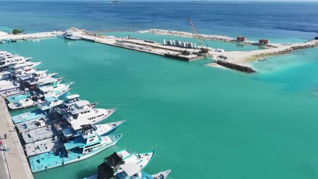 Aerial view of boats in a harbor Maldives. Aerial view of boats in a harbor Maldives.