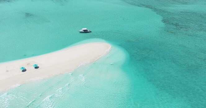 Aerial view of a white sandbank in turquoise water Maldives. Aerial view of a white sandbank in turquoise water Maldives.