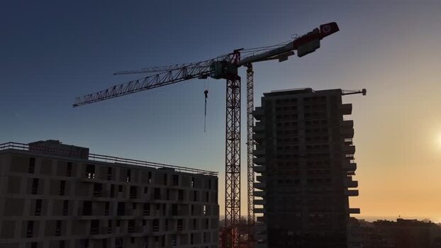 Aerial view of construction cranes near buildings Portugal.