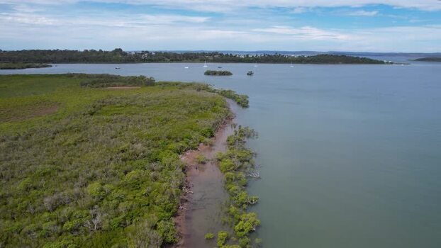 Aerial view of the lush coastline at River Heads Australia. Aerial view of the lush coastline at River Heads Australia.