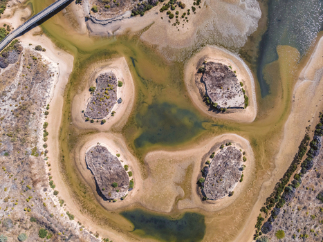 Aerial view of Ribeira de Odiaxere lagoon with rock formation near Alvor township Algarve region Portugal.