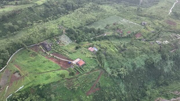 Aerial view of Joglo Java Neglasari in the hills of Indonesia. Aerial view of Joglo Java Neglasari in the hills of Indonesia.