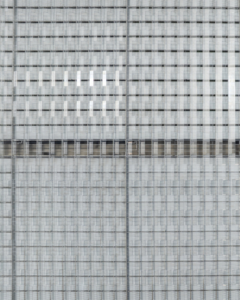 Aerial view of a modern glass building facade with a grid pattern in Aschheim Bavaria Germany.
