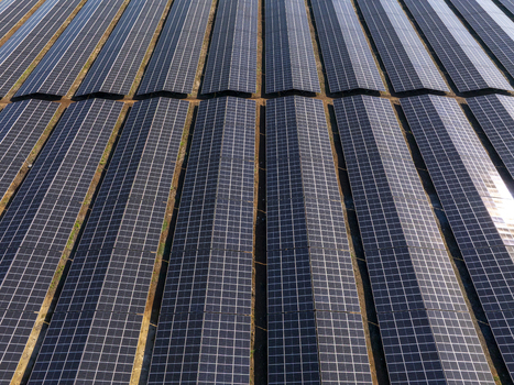Aerial view of a large solar farm with rows of photovoltaic panels arranged in neat lines in Lovech Lovech Bulgaria. Aerial view of a large solar farm with rows of photovoltaic panels arranged in neat lines in Lovech Lovech Bulgaria.