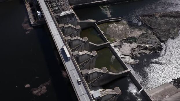 Aerial view of a hydroelectric dam with vehicles on a road Portugal. Aerial view of a hydroelectric dam with vehicles on a road Portugal.