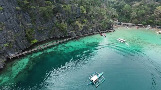 FPV aerial view of Kayangan Lake in Coron Philippines. FPV aerial view of Kayangan Lake in Coron Philippines.