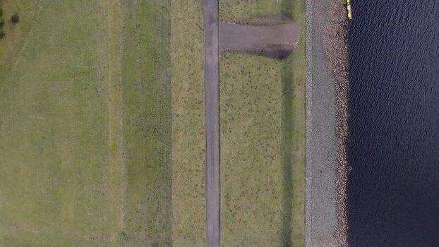 Aerial view of Whiteadder Reservoir dam and road United Kingdom. Aerial view of Whiteadder Reservoir dam and road United Kingdom.