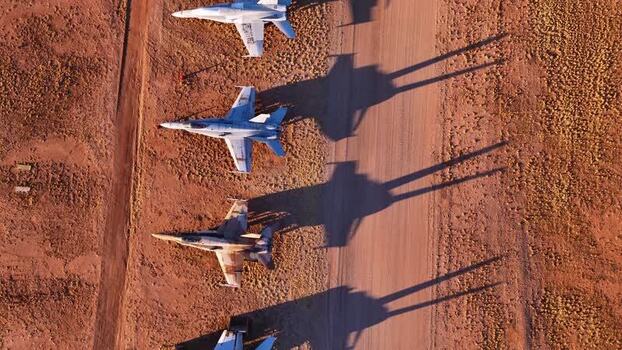 Aerial view of fighter jets on the ground United States. Aerial view of fighter jets on the ground United States.