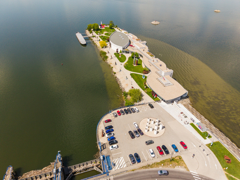 Aerial view of the Danubiana Meulensteen Art Museum on a peninsula in the Danube river with modern architecture and sculpture park Bratislava Bratislavsky kraj Slovakia. Aerial view of the Danubiana Meulensteen Art Museum on a peninsula in the Danube river with modern architecture and sculpture park Bratislava Bratislavsky kraj Slovakia.