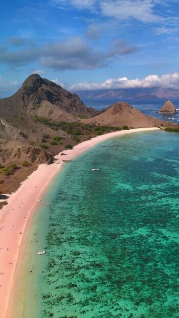 Aerial view of Pink Beach and turquoise waters in Indonesia. Aerial view of Pink Beach and turquoise waters in Indonesia.