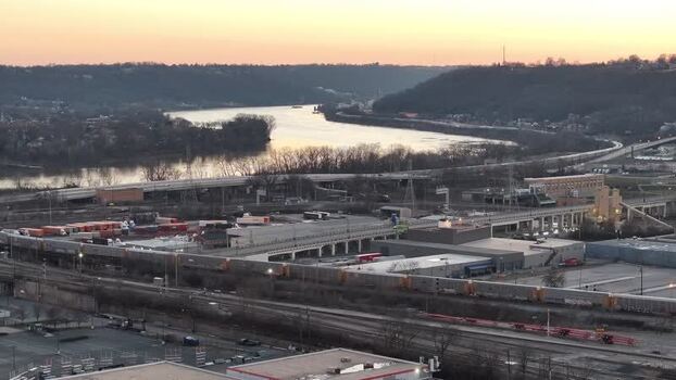 Aerial view of trainyard and Ohio River United States. Aerial view of trainyard and Ohio River United States.