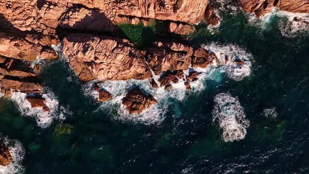 Aerial view of red granite cliffs and turquoise sea at Costa Paradiso Italy. Aerial view of red granite cliffs and turquoise sea at Costa Paradiso Italy.