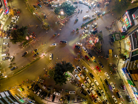 Aerial view of the bustling city intersection alive with vibrant lights and dense traffic weaving through the streets Dhaka Dhaka Division Bangladesh. Aerial view of the bustling city intersection alive with vibrant lights and dense traffic weaving through the streets Dhaka Dhaka Division Bangladesh.