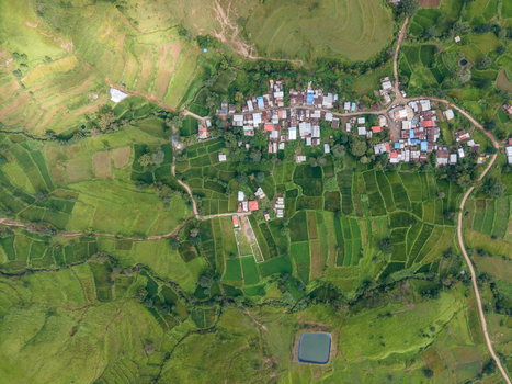 Aerial view of the lush green landscape and small village near Kaas plateau in Satara Maharashtra India.