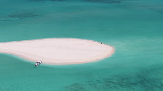 Aerial view of a white sandbank and turquoise ocean Maldives. Aerial view of a white sandbank and turquoise ocean Maldives.