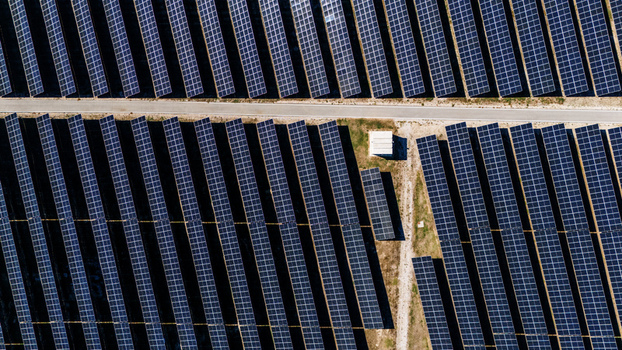 Aerial view of solar panels arranged in rows at a solar farm in Temerin Vojvodina Serbia. Aerial view of solar panels arranged in rows at a solar farm in Temerin Vojvodina Serbia.