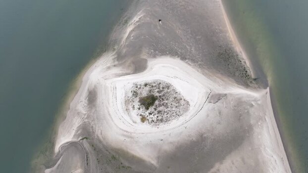 Aerial view of an eye shaped sandbank in Aveiro Lagoon Portugal.