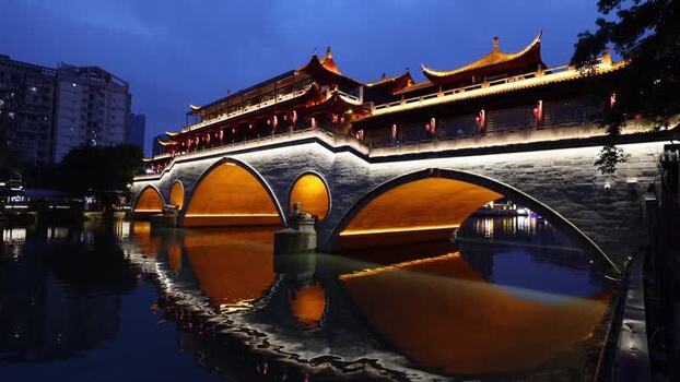 View of Anshun Bridge illuminated at night in Chengdu China. View of Anshun Bridge illuminated at night in Chengdu China.