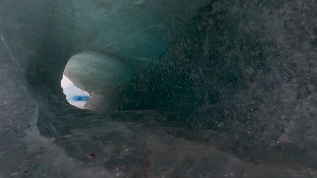 Aerial view of an ice cave tunnel in Iceland. Aerial view of an ice cave tunnel in Iceland.