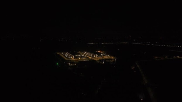 Aerial view of illuminated data center Netherlands.