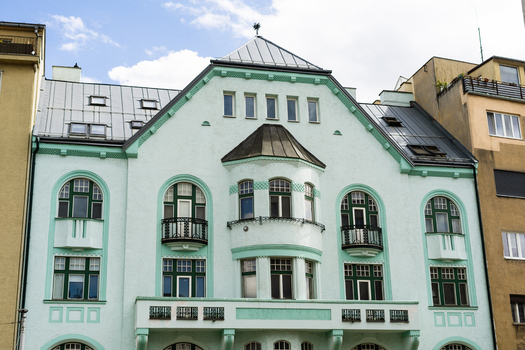 View of the ornate mint green facade of a historic Art Nouveau building with arched windows and decorative balconies Bratislava Bratislava Region Slovakia. View of the ornate mint green facade of a historic Art Nouveau building with arched windows and decorative balconies Bratislava Bratislava Region Slovakia.