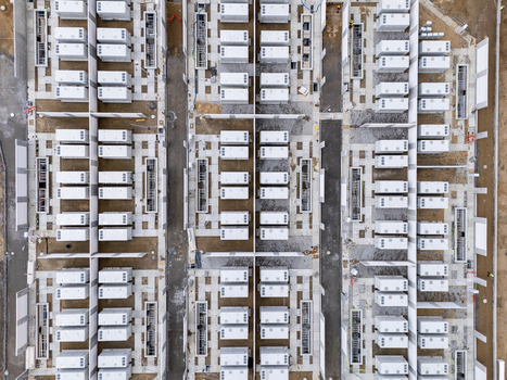 Aerial view of Zarnowiec Pumped Storage Power Station featuring rows of white energy storage containers on a construction site in Wejherowo County Pomeranian Voivodeship Poland.