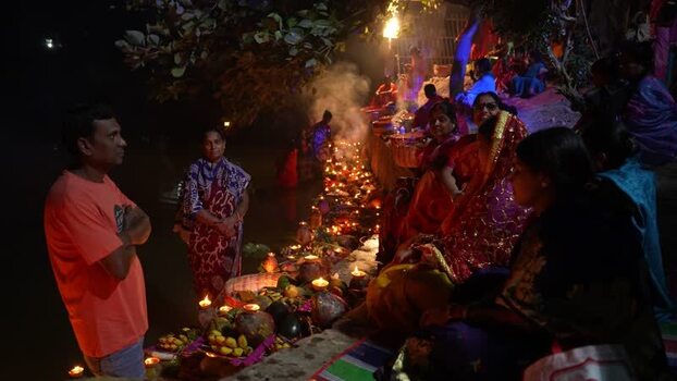 View of people performing religious rituals with oil lamps Bangladesh. View of people performing religious rituals with oil lamps Bangladesh.