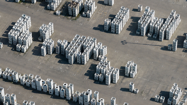 Aerial view of stacks of precast concrete blocks and drainage components organized in a storage yard Oosterhout North Brabant Netherlands. Aerial view of stacks of precast concrete blocks and drainage components organized in a storage yard Oosterhout North Brabant Netherlands.