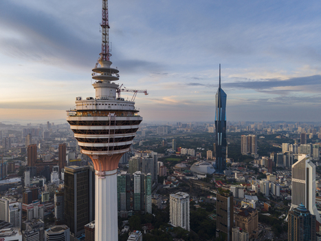 Kuala Lumpur Malaysia 11 March 2026 Aerial view of the KL Tower and Merdeka 118 skyscraper towering over the urban skyline during sunset.