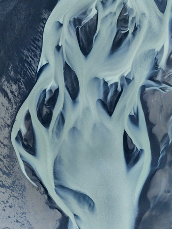 Aerial view of glacial rivers carving paths through Iceland s stark landscape creating a mesmerizing tapestry of turquoise and grey Iceland. Aerial view of glacial rivers carving paths through Iceland s stark landscape creating a mesmerizing tapestry of turquoise and grey Iceland.
