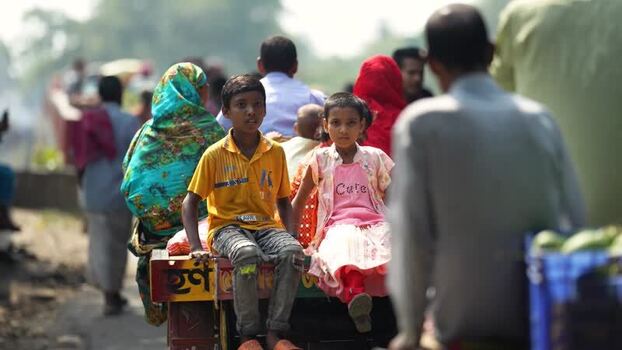View of children and people on a transport vehicle Bangladesh.