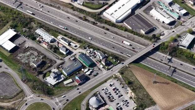 Aerial view of highway with buildings France.