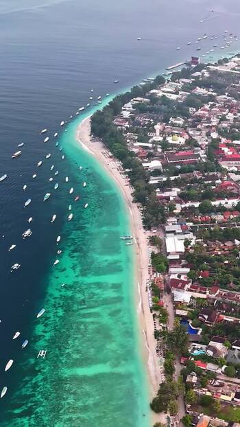 Aerial view of the turquoise coastline in Bali Indonesia.