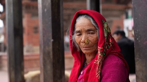 View of an elderly woman in traditional attire in Kathmandu Nepal.