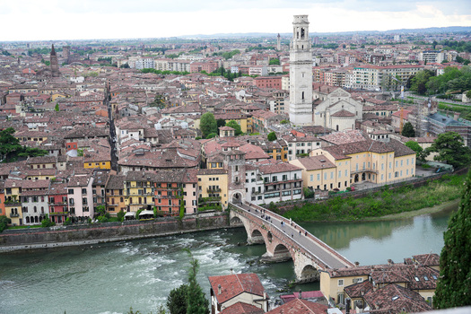 Aerial view of the historic center of Verona featuring the Ponte Pietra bridge over the Adige River and the Verona Cathedral tower Verona Veneto Italy.