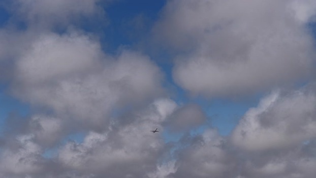 Aerial view of a plane flying through clouds Portugal.