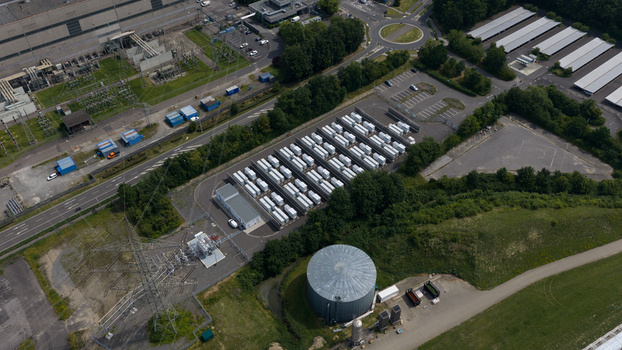 Aerial view of Battery Energy Storage Park Beside Traditional Power Plant Aerial view of Battery Energy Storage Park Beside Traditional Power Plant