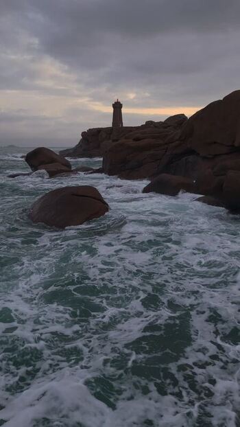 Aerial view of Phare de Men Ruz on the coast of France.