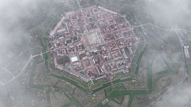 Aerial view of the city under dense fog France.