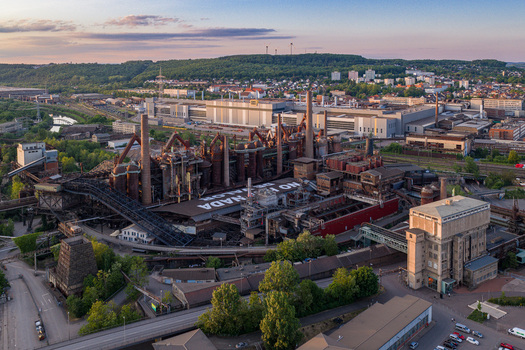 Volklingen Germany 09 May 2026 Aerial view of the Volklingen Ironworks industrial complex with its blast furnaces and pipes under a soft evening sky. Volklingen Germany 09 May 2026 Aerial view of the Volklingen Ironworks industrial complex with its blast furnaces and pipes under a soft evening sky.