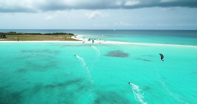 Aerial view of kitesurfers in Los Roques archipelago Venezuela.