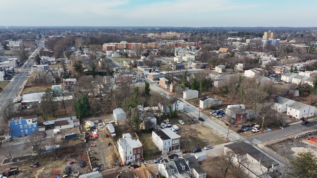 Aerial view of the urban landscape featuring residential buildings streets and sparse trees in Chester Pennsylvania United States. Aerial view of the urban landscape featuring residential buildings streets and sparse trees in Chester Pennsylvania United States.