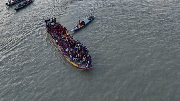 Aerial view of a crowded ferry boat on a river Bangladesh.