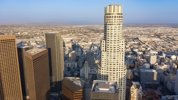 Aerial view of the US Bank Tower and the dense downtown Los Angeles skyline under a clear sky in Los Angeles California United States.