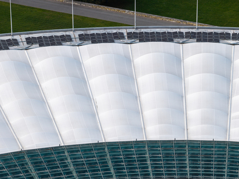 Berlin Germany 26 September 2026 Aerial view of the white membrane roof of the Olympiastadion Berlin featuring repeating arched panels and glass sections.