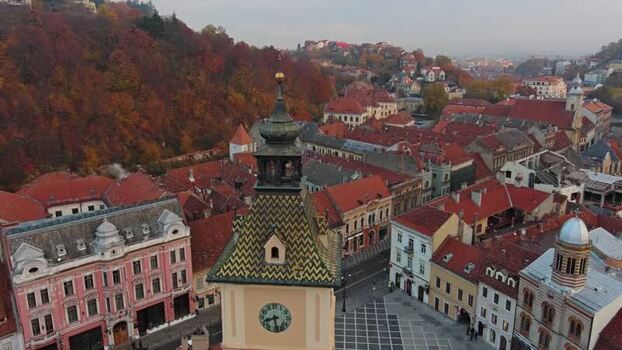 Aerial view of Council Square and clock tower in Brasov Romania. Aerial view of Council Square and clock tower in Brasov Romania.