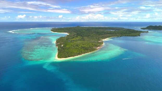 Aerial view of Sipura Island and turquoise waters Indonesia.