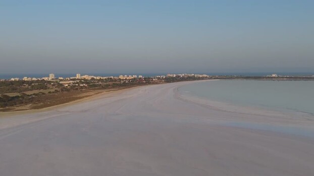 Aerial view of Larnaca Salt Lake and city skyline Cyprus.